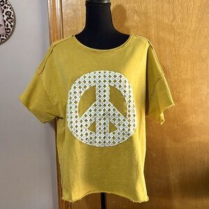 Size S short sleeve sweatshirt. Raw hem & sleeves. Front and back designs. NWT.